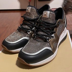 brand new michael kors trainer sneakers!! too small for me , but they fit size 8